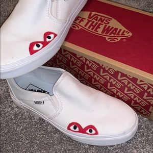 Custom Vans with the Comme Des Garçons Play logo.